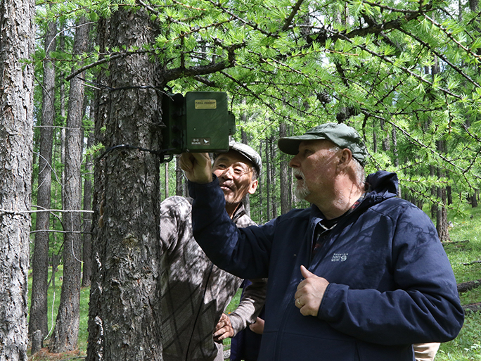 Dr. Pijanowski and Soundscape team working on fixing a sensor.