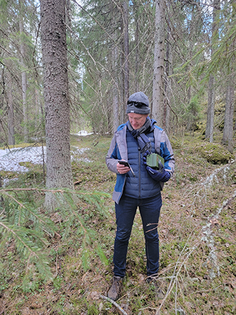 Researcher in a forest in Mongolia.